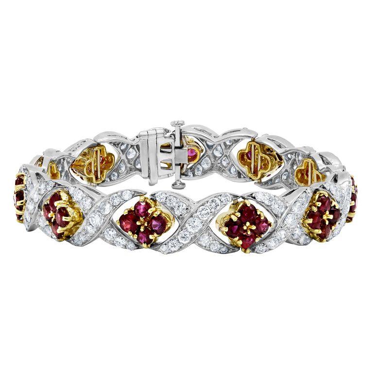 18 kt white and yellow gold ruby and diamond bracelet in a XOXO design adorned with 5.00 cts tw of rubies and 7.00 cts tw of diamonds