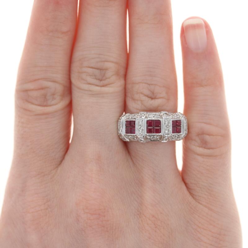 Size: 7
Sizing Fee: Up 1 size for $50

Metal Content: 14k White Gold

Stone Information
Genuine  Rubies
Treatment: Heating 
Carats: 1.12ctw
Cut: Square
Color: Pinkish Red

Natural Diamonds
Carats: .56ctw
Cut: Round Brilliant 
Color: I - J
Clarity: