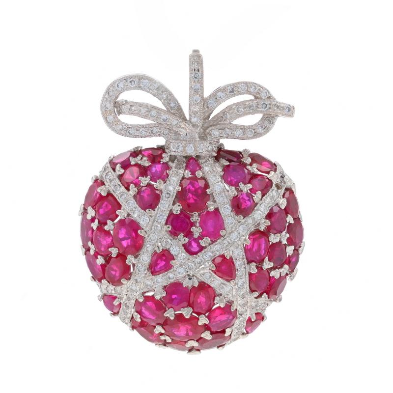 Metal Content: 18k White Gold

Stone Information

Natural Rubies
Treatment: Heating
Carat(s): 4.64ctw
Cut: Oval, Pear, & Round
Color: Pinkish Red

Natural Diamonds
Carat(s): .59ctw
Cut: Round Brilliant
Color: H - I
Clarity: VS2 - SI2

Total Carats: