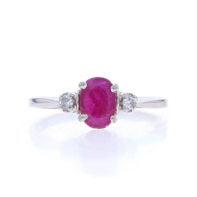 Size: 7
Sizing Fee: Up 3 sizes for $30 or Down 1 1/2 sizes for $30

Metal Content: 14k White Gold

Stone Information

Natural Ruby
Treatment: Heating
Carat(s): 1.06ct
Cut: Oval
Color: Opaque Purplish Red

Natural Diamonds
Carat(s): .06ctw
Cut: Round
