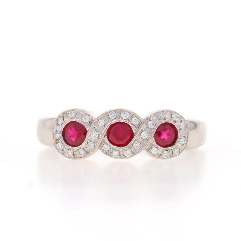Size: 6 3/4
Sizing Fee: Up 2 1/2 sizes for $35 or Down 2 sizes for $30

Metal Content: 14k White Gold

Stone Information
Natural Rubies
Treatment: Heating
Carat(s): .45ctw
Cut: Round
Color: Red

Natural Diamonds
Carat(s): .12ctw
Cut: Round