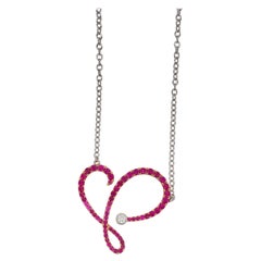 White Gold Ruby 
Diamond Swirl Pendant Necklace