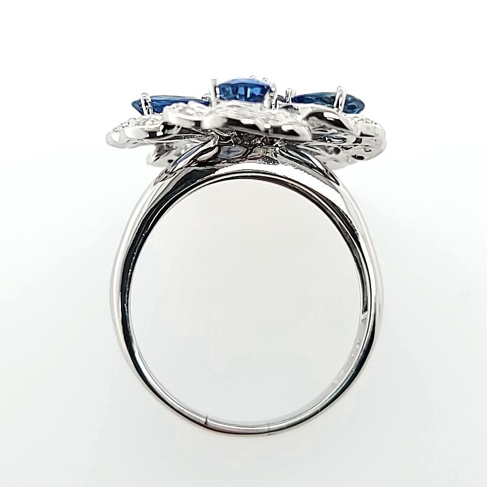 White Gold Sapphire and Diamond Flower Ring In Good Condition In Coral Gables, FL