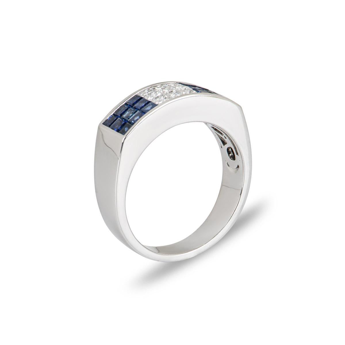 A sapphire and diamond dress ring in 18k white gold. The ring is composed of 18 princess cut sapphires totalling 2.00ct and 9 princess cut diamonds totalling 0.50ct. The diamonds are G colour, VS clarity and the sapphires have an even rich blue