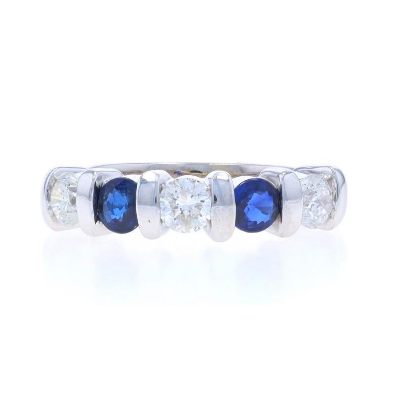 Size: 5
Sizing Fee: Up 1/2 a size for $50 or Down 1/2 a size for $50

Metal Content: 14k White Gold

Stone Information

Natural Sapphires
Treatment: Heating
Carat(s): .64ctw
Cut: Round
Color: Blue

Natural Diamonds
Carat(s): .60ctw
Cut: Round