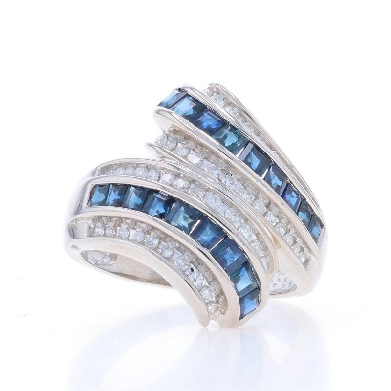 Size: 7 3/4

Metal Content: 14k White Gold

Stone Information

Natural Sapphires
Treatment: Heating
Carat(s): 1.26ctw
Cut: Square
Color: Blue

Natural Diamonds
Carat(s): .36ctw
Cut: Single
Color: G - H
Clarity: VS1 - VS2

Total Carats: