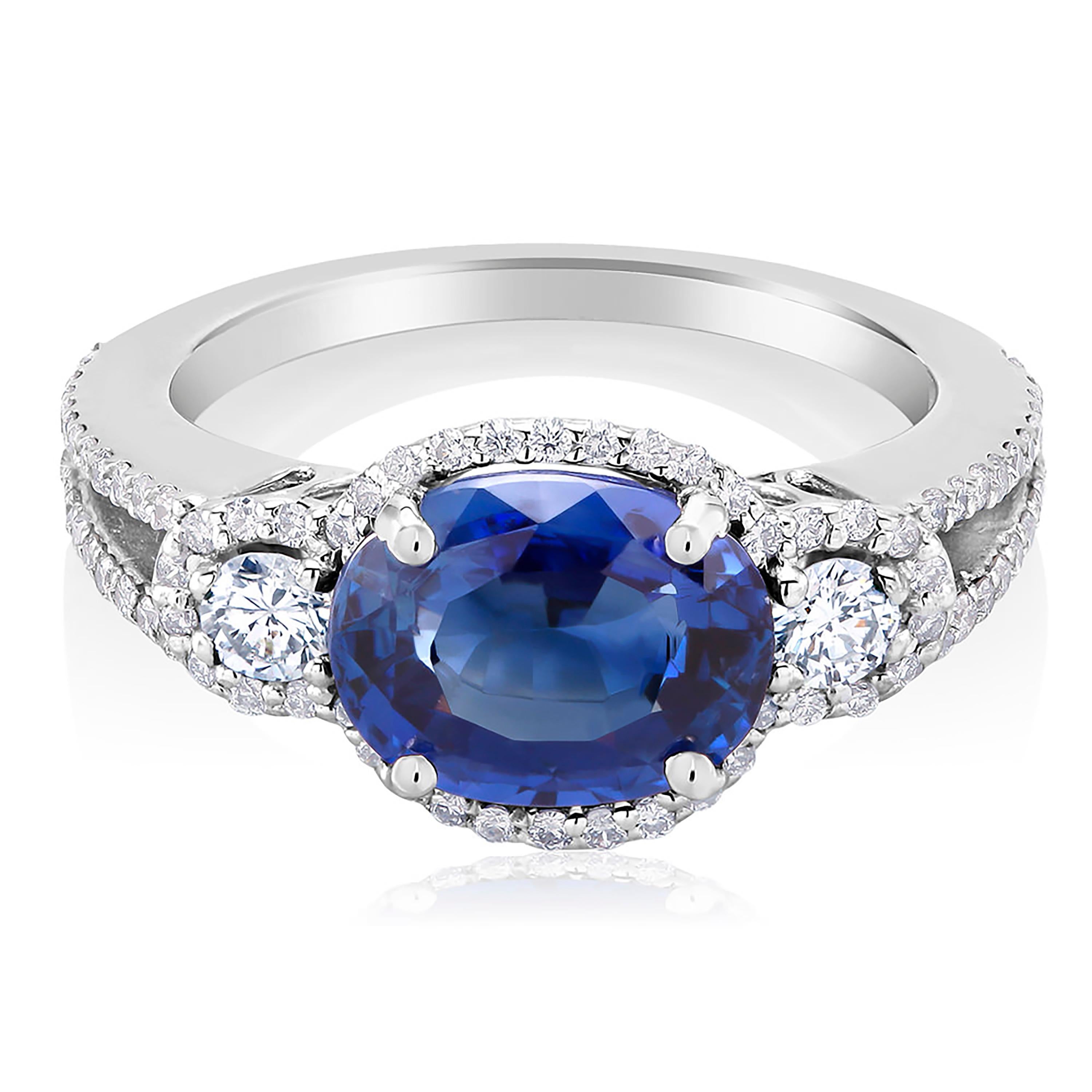 Oval Cut Sapphire and Diamond Cluster White Gold Cocktail Ring Weighing 4.10 Carat