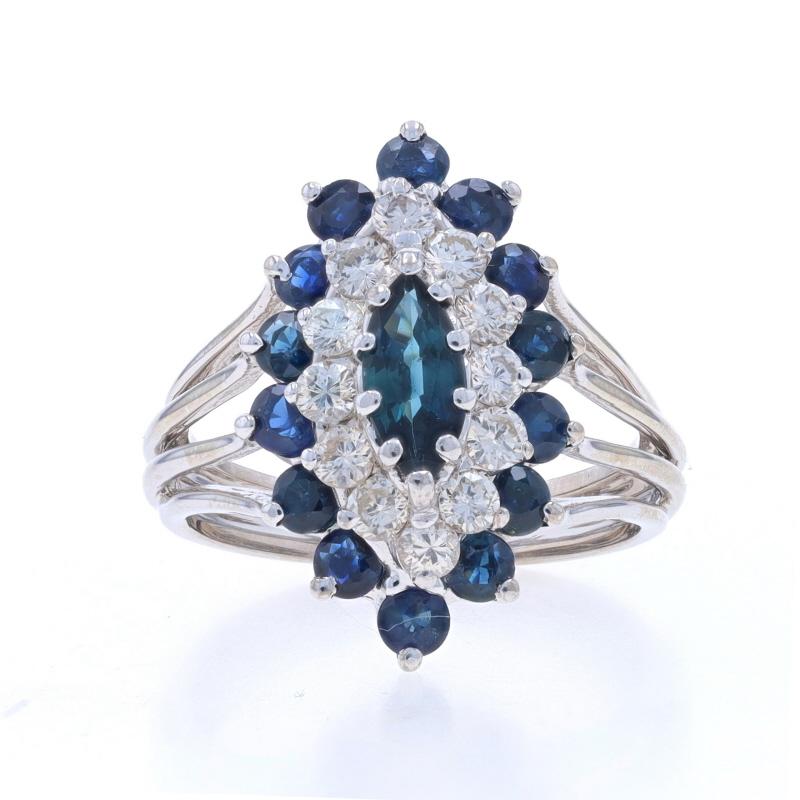 Size: 8
Sizing Fee: Up 2 sizes for $60 or Down 2 sizes for $40

Metal Content: 14k White Gold

Stone Information

Natural Sapphires
Treatment: Heating
Carat(s): 2.57ctw
Cut: Marquise & Round
Color: Greeish Blue & Blue

Natural Diamonds
Carat(s):