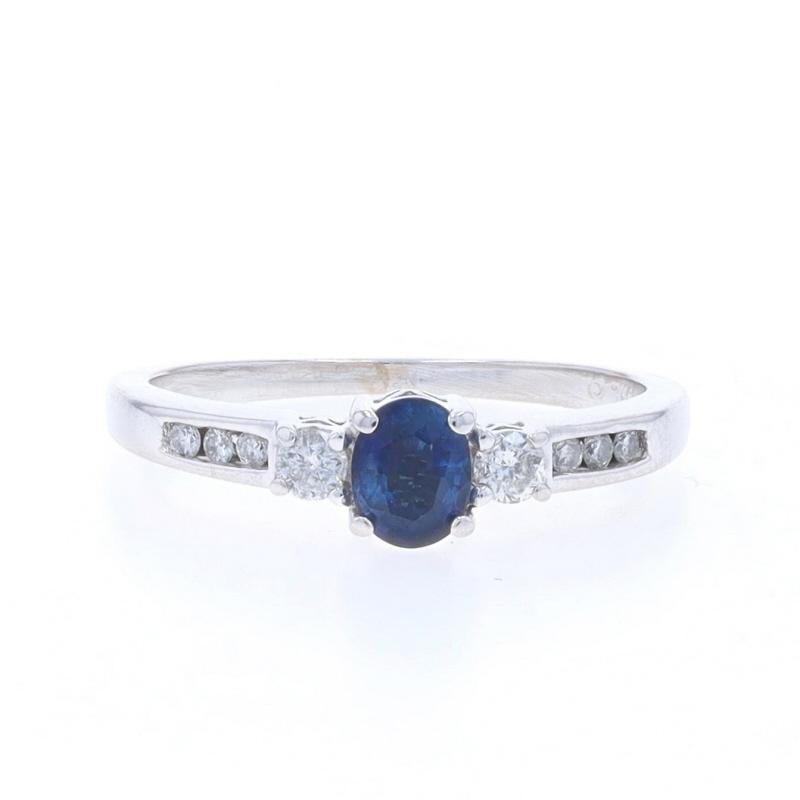 Size: 6 1/4
Sizing Fee: Up 1/2 a size for $40 or Down 1/2 a size for $40

Metal Content: 14k White Gold

Stone Information

Natural Sapphire
Treatment: Heating
Carat(s): .45ct
Cut: Oval
Color: Blue

Natural Diamonds
Carat(s): .16ctw
Cut: Round