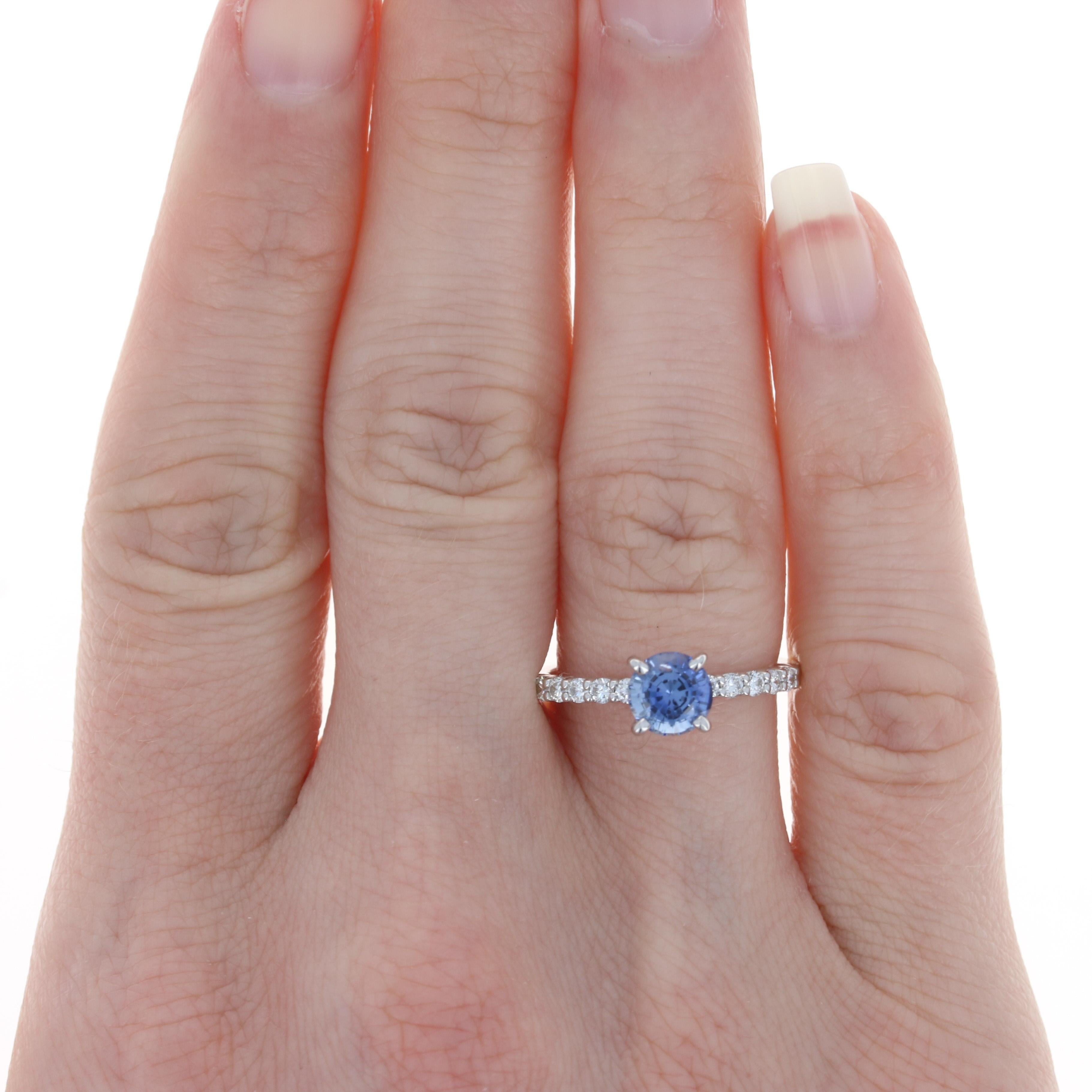 Engagement Ring Size: 6 1/2
Wedding Band Size: 6 1/4
Sizing Fee: Down 1 size for $50 per ring or Up 2 sizes for $60 per ring

Metal Content: 18k White Gold

Stone Information: 
Natural Sapphire
Treatment: Heating
Carat: 1.21ct
Cut: Round
Color: