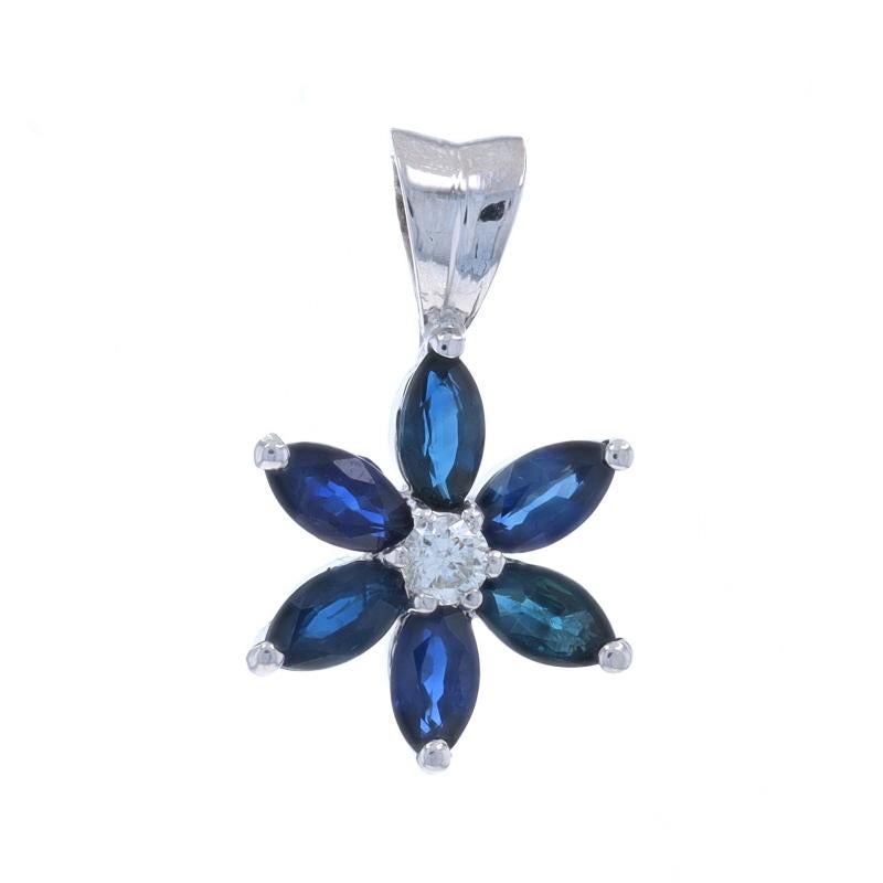Metal Content: 14k White Gold

Stone Information

Natural Sapphires
Treatment: Heating
Carat(s): 2.38ctw
Cut: Marquise
Color: Blue

Natural Diamond
Carat(s): .13ct
Cut: Round Brilliant
Color: F
Clarity: SI2

Total Carats: 2.51ctw

Style: Halo
Theme: