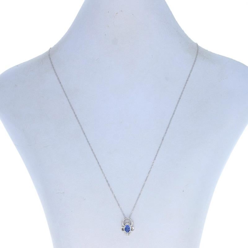 Metal Content: 18k White Gold

Stone Information

Natural Sapphire
Treatment: Heating
Carat(s): .72ct
Cut: Oval
Color: Blue

Natural Diamonds
Carat(s): .04ctw
Cut: Round Brilliant
Color: G
Clarity: VS1 - VS2

Total Carats: .76ctw

Style: Chain