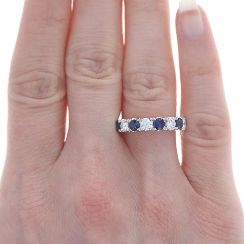 Size: 7
Sizing Fee: Up 2 sizes for $50 or Down 1 size for $35

Metal Content: 18k White Gold

Stone Information
Natural Sapphires
Treatment: Heating
Carat(s): .95ctw
Cut: Round
Color: Blue

Natural Diamonds
Carat(s): .59ctw
Cut: Round