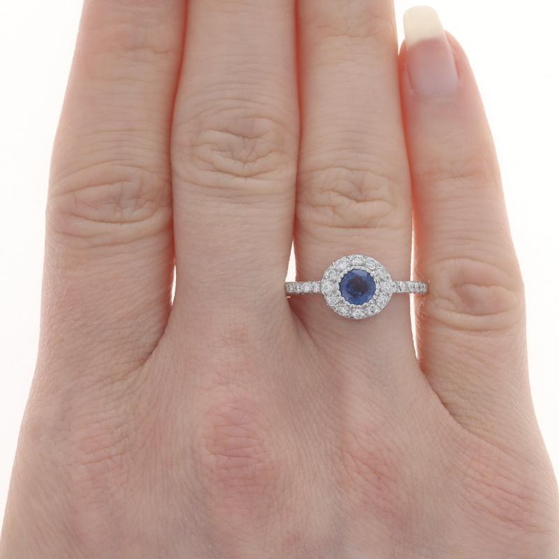 Size: 6 1/2
Sizing Fee: Up 2 sizes for $35 or Down 1 Size for $30

Metal Content: 14k White Gold

Stone Information

Natural Sapphire
Treatment: Heating
Carat(s): .70ct
Cut: Round
Color: Blue

Natural Diamonds
Carat(s): .25ctw
Cut: Round