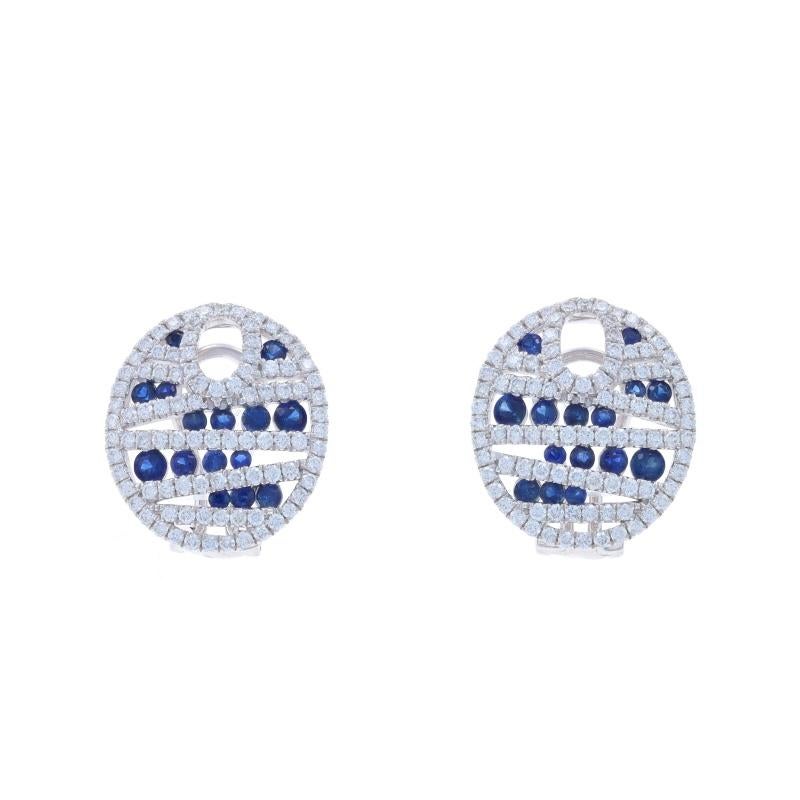 Contenu métallique : Or blanc 14k

Informations sur les pierres

Saphirs naturels
Traitement : Chauffage
Carat(s) : .87
Coupe : Ronde
Couleur : Bleu

Diamants naturels
Carat(s) : 0.96ctw
Coupe : Brillant rond
Couleur : G
Clarté : SI1

Total des