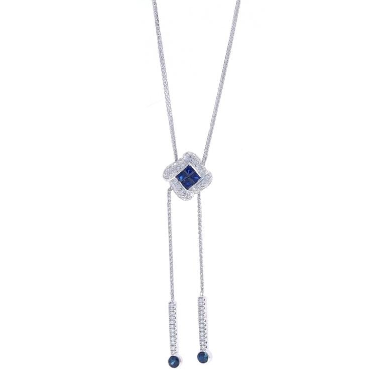 Metal Content: 14k White Gold

Stone Information

Natural Sapphires
Treatment: Heating
Carat(s): .70ctw
Cut: Princess & Round
Color: Blue

Natural Diamonds
Carat(s): .50ctw
Cut: Round Brilliant
Color: G - H
Clarity: SI1 - SI2

Total Carats: