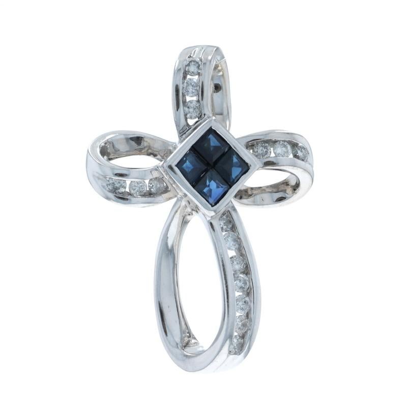 Metal Content: 14k White Gold

Stone Information

Natural Sapphires
Treatment: Heating
Carat(s): .32ctw
Cut: Square

Natural Diamonds
Carat(s): .25ctw
Cut: Round Brilliant
Color: H - I
Clarity: I1 - I2

Total Carats: .57ctw

Theme: Ribbon Cross,