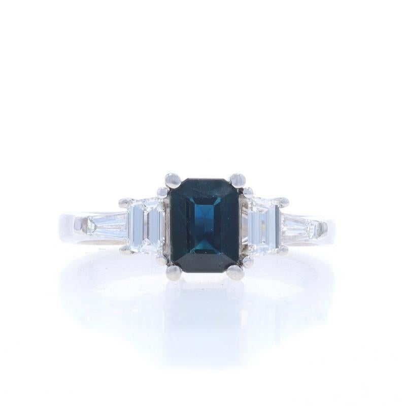 Size: 8 1/2
Sizing Fee: Up 1/2 a size for $40 or Down 1 size for $40

Metal Content: 14k White Gold

Stone Information

Natural Sapphire
Treatment: Heating
Carat(s): .90ct
Cut: Emerald
Color: Greenish Blue

Natural Diamonds
Carat(s): .78ctw
Cut: