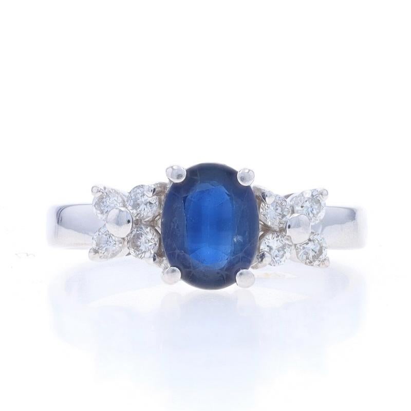 Size: 8 1/2
Sizing Fee: Up 3 sizes for $40 or Down 2 sizes for $30

Metal Content: 14k White Gold

Stone Information

Natural Sapphire
Treatment: Heating
Carat(s): 1.55ct
Cut: Oval
Color: Blue

Natural Diamonds
Carat(s): .32ctw
Cut: Round