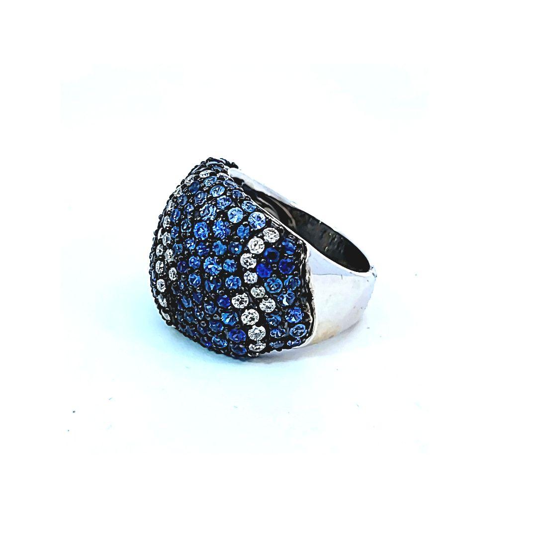 Such a beauty!  With an estimated total weight of 4.40 carats of lovely blue sapphires, this ring is a stunner!