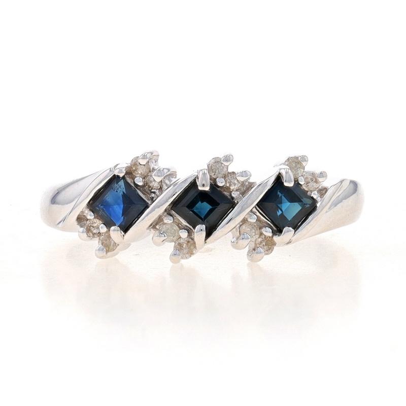 Size: 7
Sizing Fee: Up 1/2 a size for $40 or Down 1/2 a size for $40

Metal Content: 14k White Gold

Stone Information

Natural Sapphires
Treatment: Heating
Carat(s): .42ctw
Cut: Square
Color: Blue

Natural Diamonds
Carat(s): .12ctw
Cut: Round