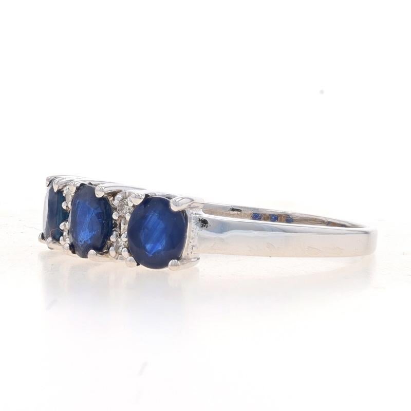 Size: 7 3/4
Sizing Fee: Up 2 sizes for $25 or Down 2 sizes for $25

Metal Content: 14k White Gold

Stone Information

Natural Sapphires
Treatment: Heating
Carat(s): 1.14ctw
Cut: Oval
Color: Blue

Natural Diamonds
Carat(s): .04ctw
Cut: Round