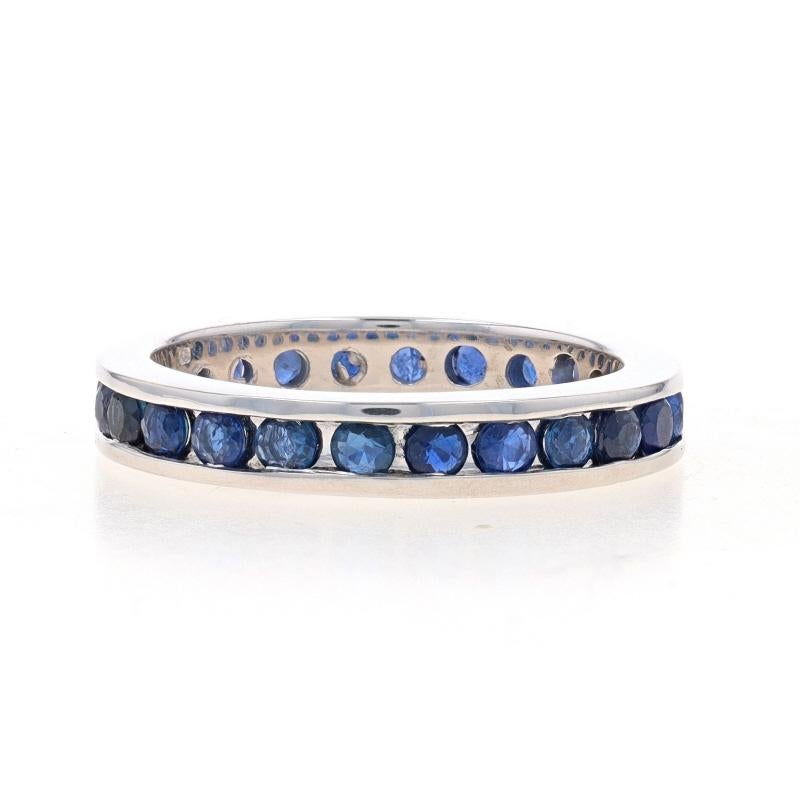 Size: 7 1/2

Metal Content: 14k White Gold

Stone Information

Natural Sapphires
Treatment: Heating
Carat(s): 1.90ctw
Cut: Round
Color: Blue

Total Carats: 1.90ctw

Style: Eternity Wedding Band with Gemstones

Measurements

Face Height (north to