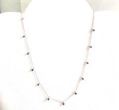 Collier à franges en or blanc et saphir
