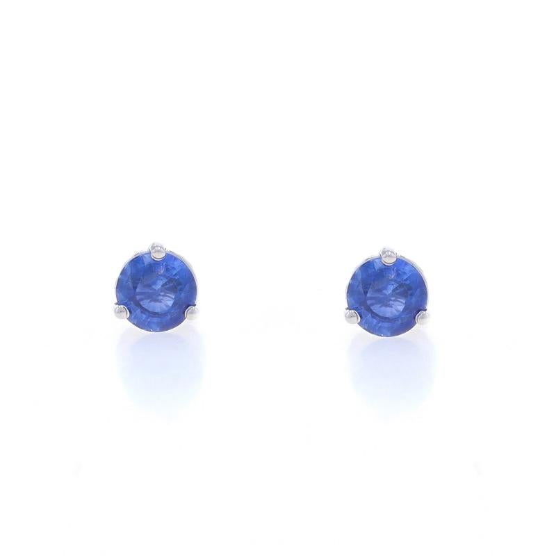 Metal Content: 14k White Gold

Stone Information

Natural Sapphires
Treatment: Heating
Carat(s): 1.01ctw
Cut: Round
Color: Blue

Total Carats: 1.01ctw

Style: Stud
Fastening Type: Pierced Screw-On Closures

Measurements

Tall: 7/32