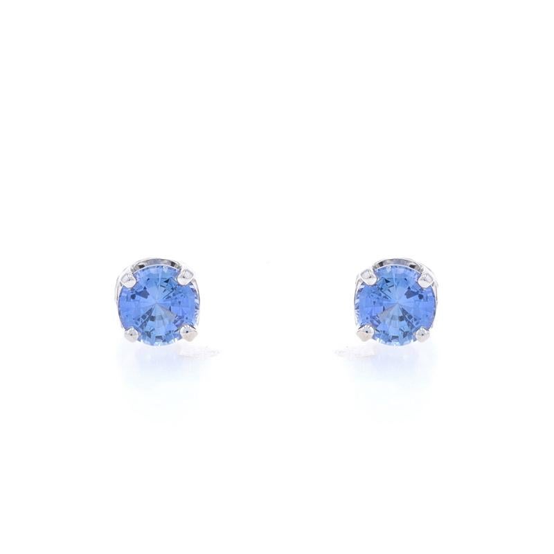 Metal Content: 14k White Gold

Stone Information

Natural Sapphires
Treatment: Heating
Carat(s): 1.94ctw
Cut: Round
Color: Blue
Size: 6mm & 6.1mm

Total Carats: 1.94ctw

Style: Stud
Fastening Type: Butterfly Closures

Measurements

Item 1: Earring