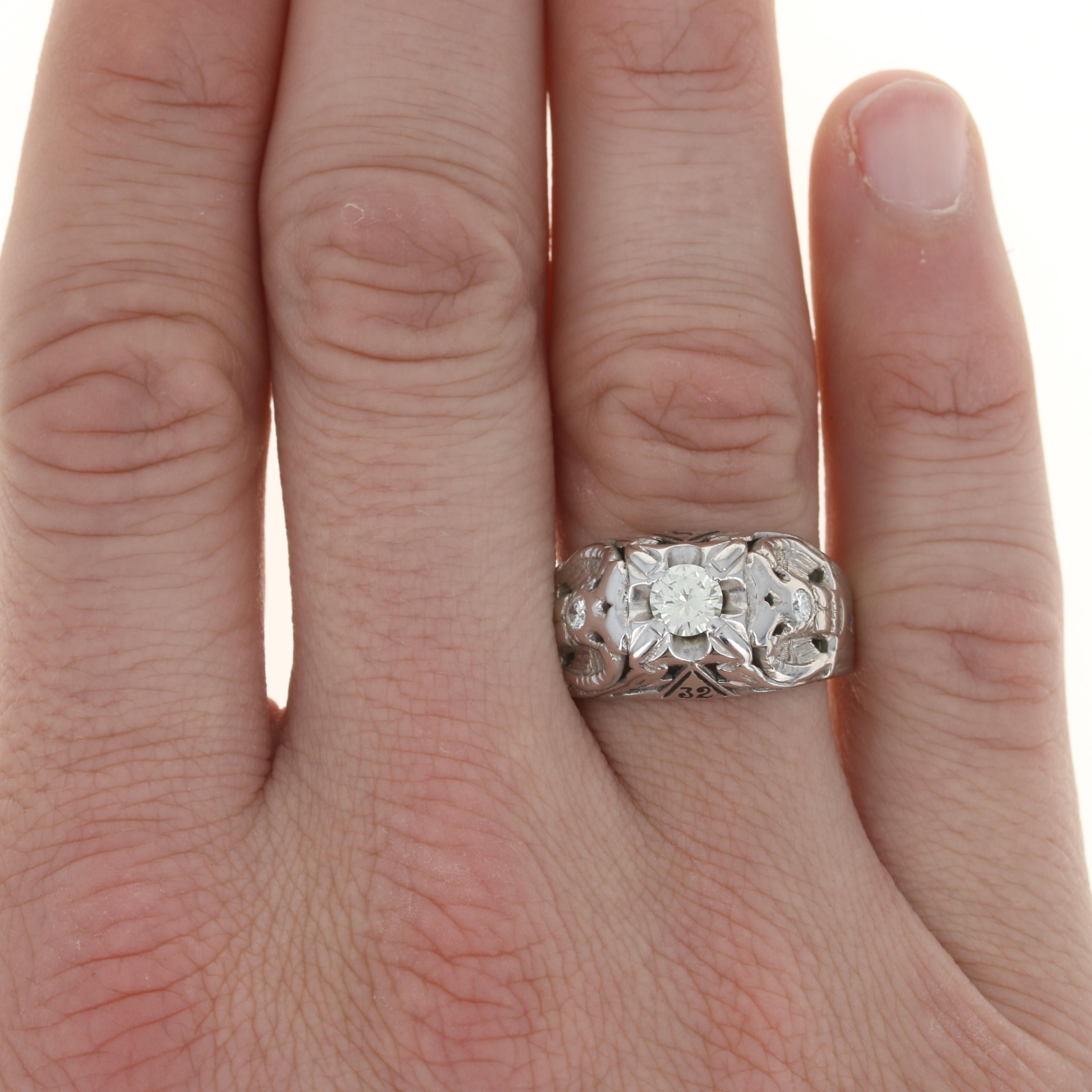 Size: 11 1/2
Sizing Fee: Down to 1 size for $40 or up to 2 sizes for $60 
(If re-sized, the enamel worn will be gone.)

Organization: Scottish Rite

Era: Vintage

Metal Content: 10k White Gold

Stone Information
Natural Diamond Solitaire
Carat: