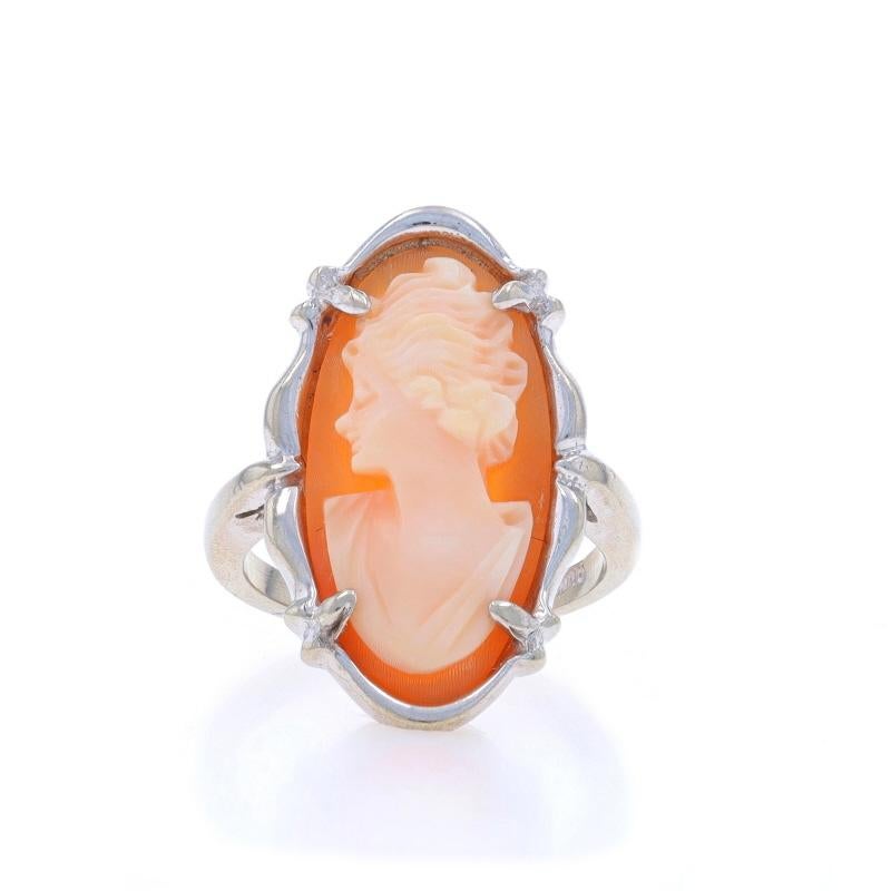 Size: 4
Sizing Fee: Up 1 size for $30 or Down 1 size for $30

Metal Content: 14k White Gold

Stone Information

Natural Shell
Cut: Carved Cameo
Size: 20mm x 10mm

Style: Cocktail Solitaire
Theme: Silhouette

Measurements

Face Height (north to