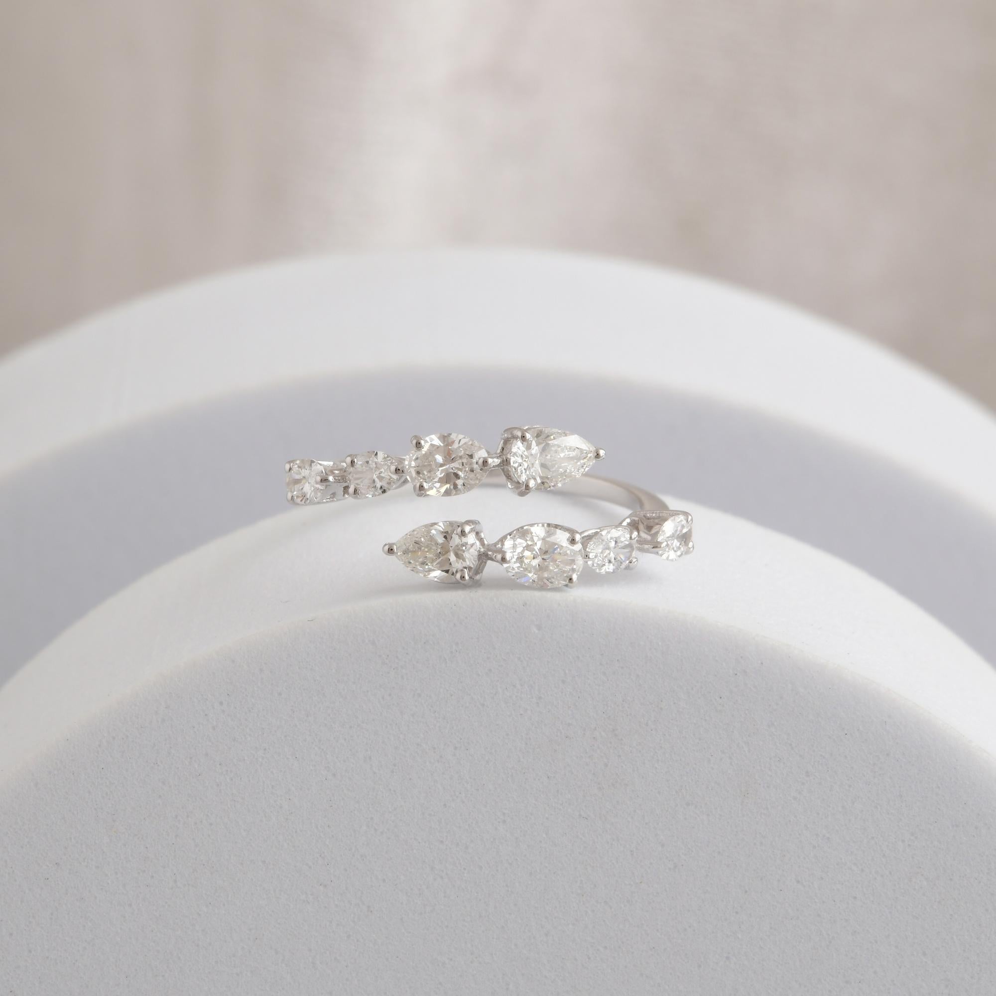 For Sale:  Spectrum Jewels Natural SI/H Diamond 14 Karat White Gold Open Bypass Ring 9