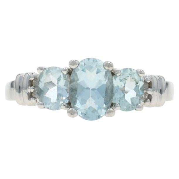 White Gold Sky Blue Topaz Diamond Three-Stone Ring - 10k Oval 1.56ctw For Sale