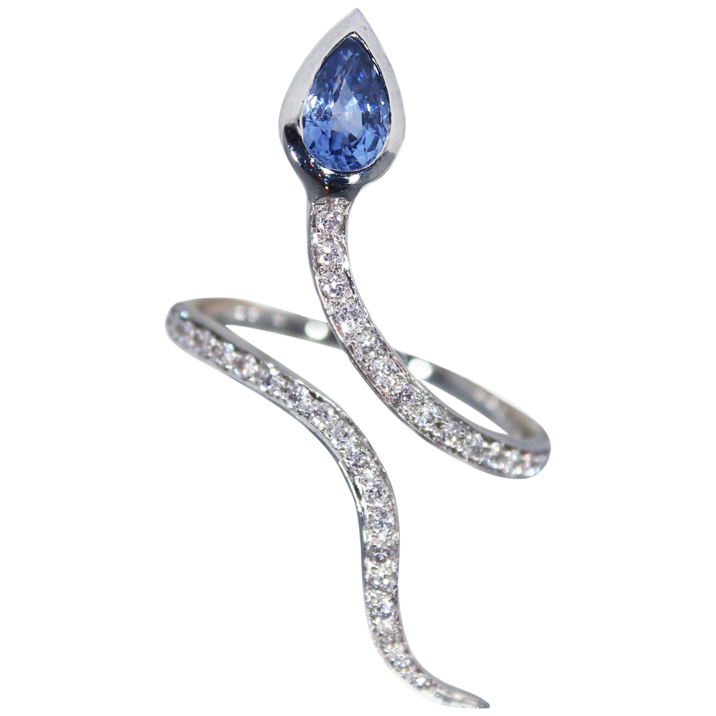 White Gold Snakes Ring with Diamonds and Sapphire For Sale
