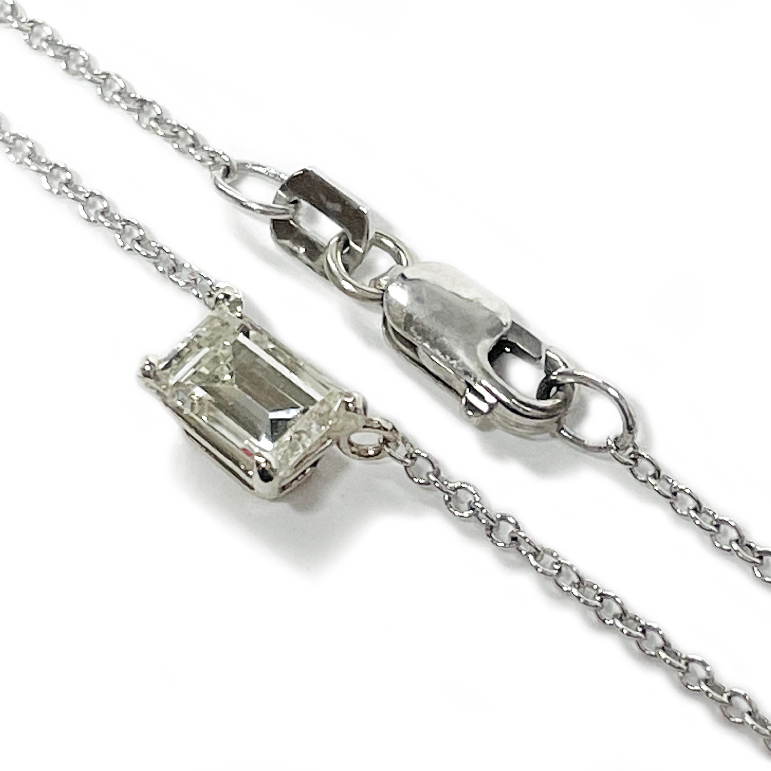 Modern White Gold Solitaire Emerald Cut Diamond Pendant Necklace, 0.63 Carat For Sale