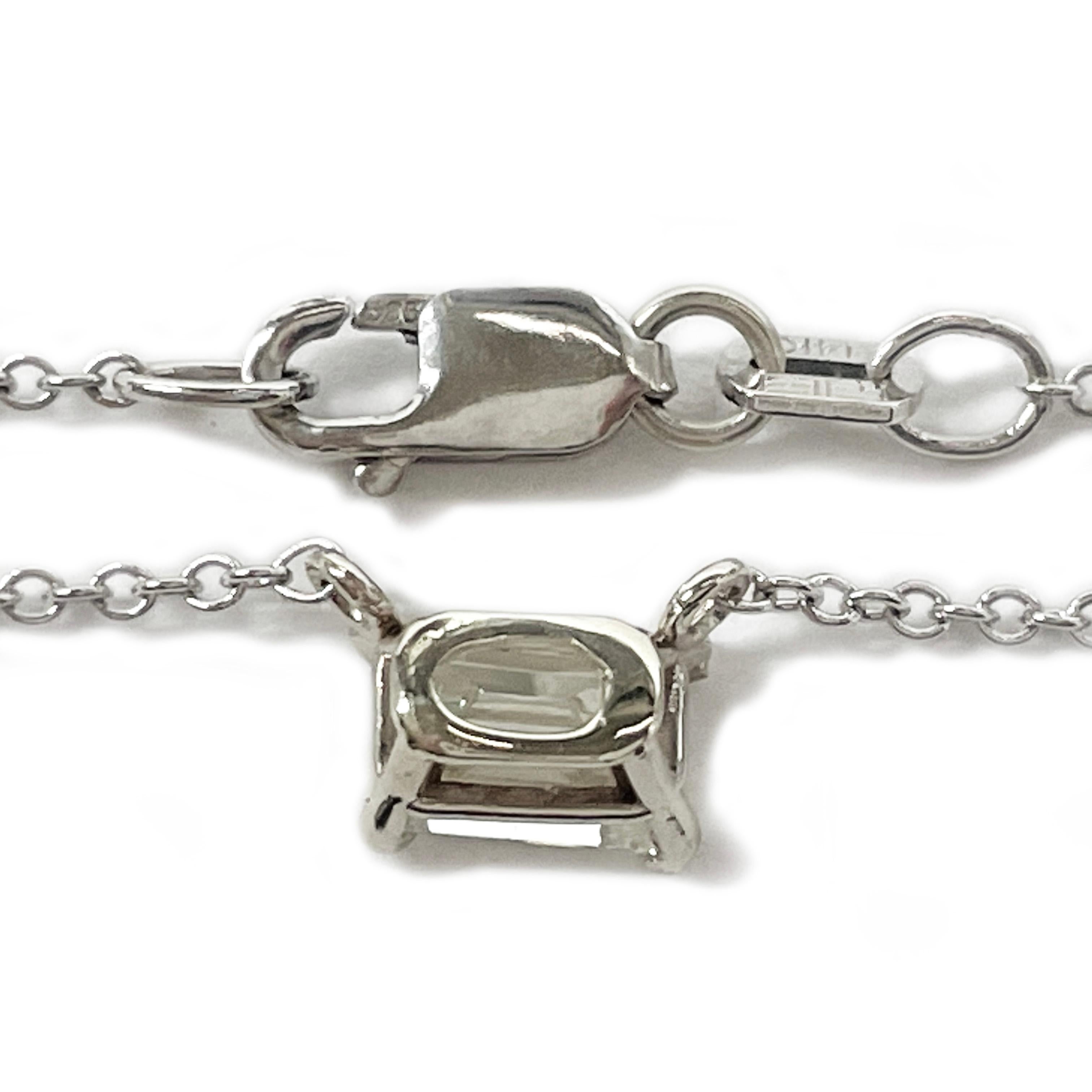 White Gold Solitaire Emerald Cut Diamond Pendant Necklace, 0.63 Carat In Excellent Condition For Sale In Palm Desert, CA