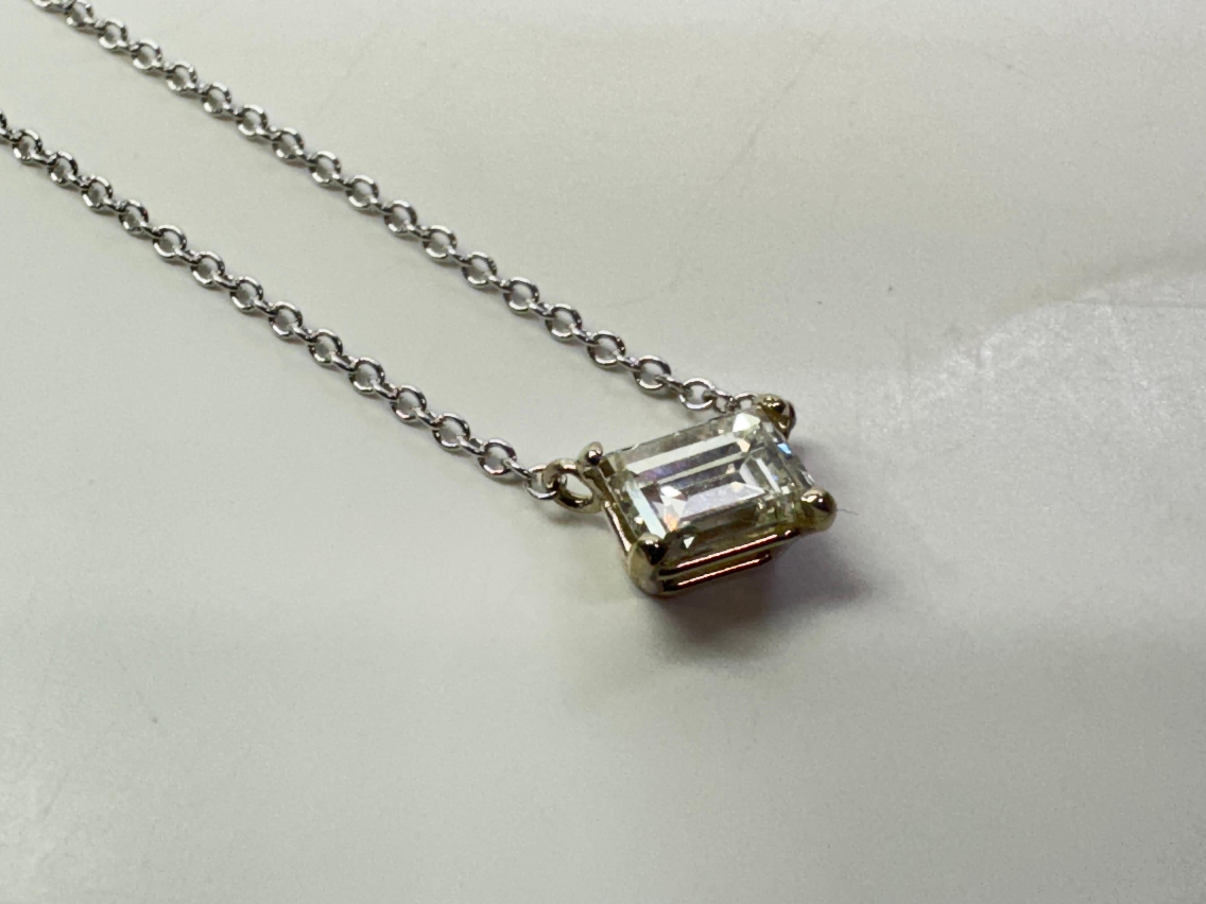 White Gold Solitaire Emerald Cut Diamond Pendant Necklace, 0.63 Carat For Sale 2