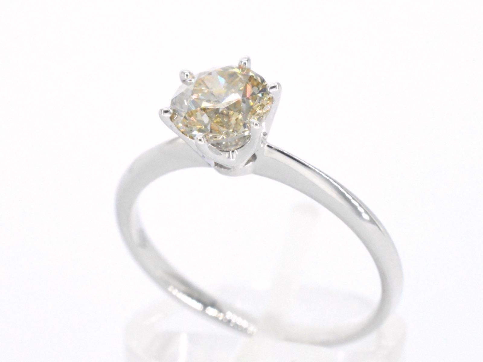 Contemporary White Gold Solitaire Ring with Diamond For Sale