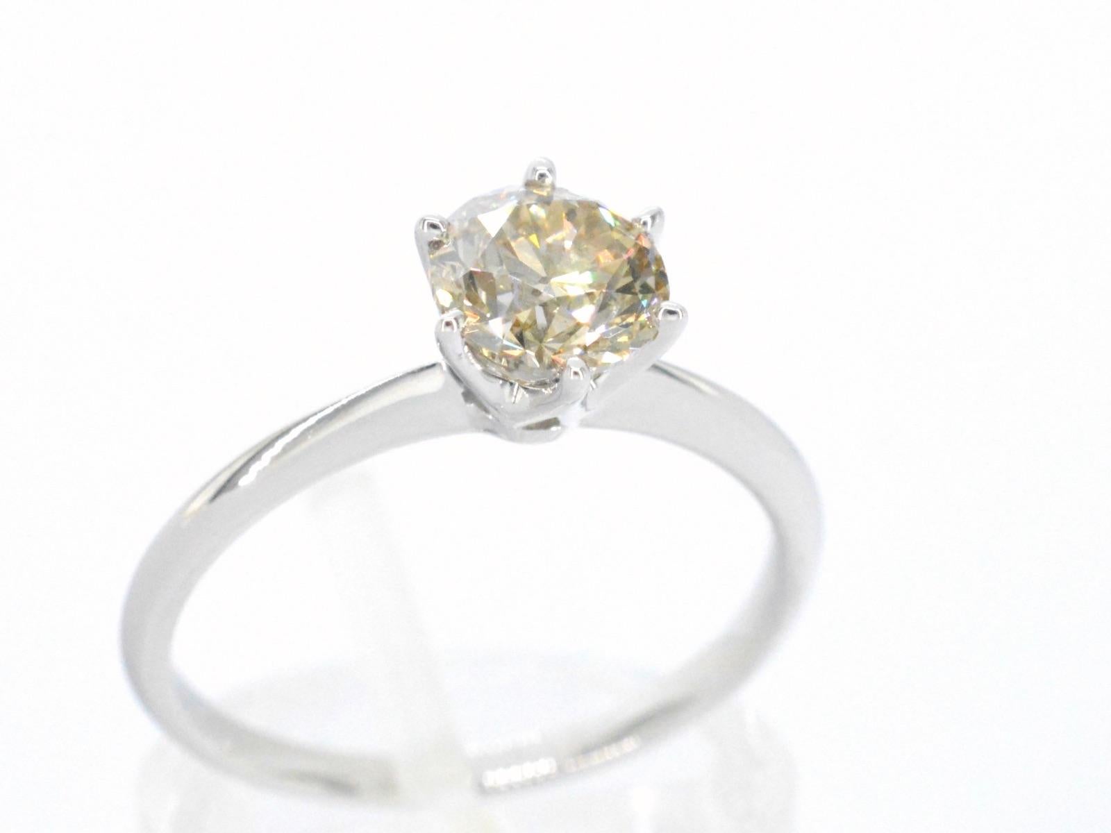 Brilliant Cut White Gold Solitaire Ring with Diamond For Sale