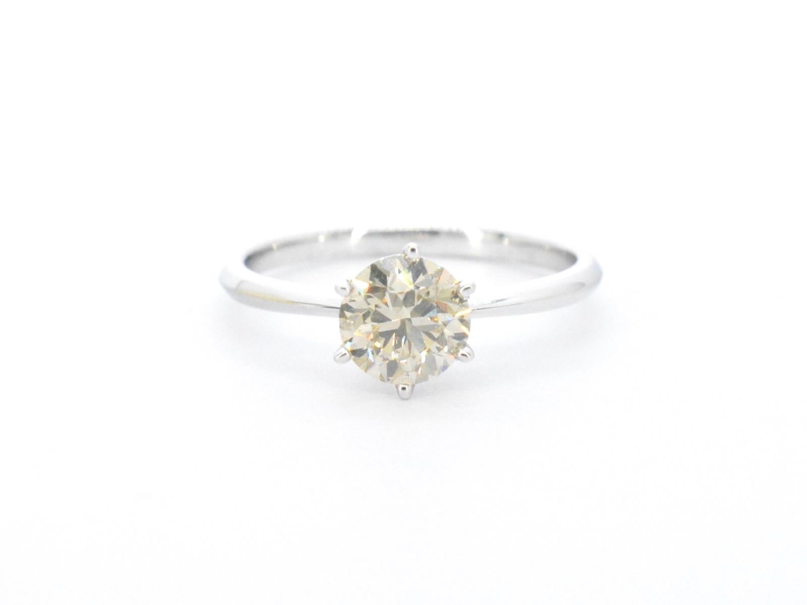 Women's White Gold Solitaire Ring with Diamond For Sale