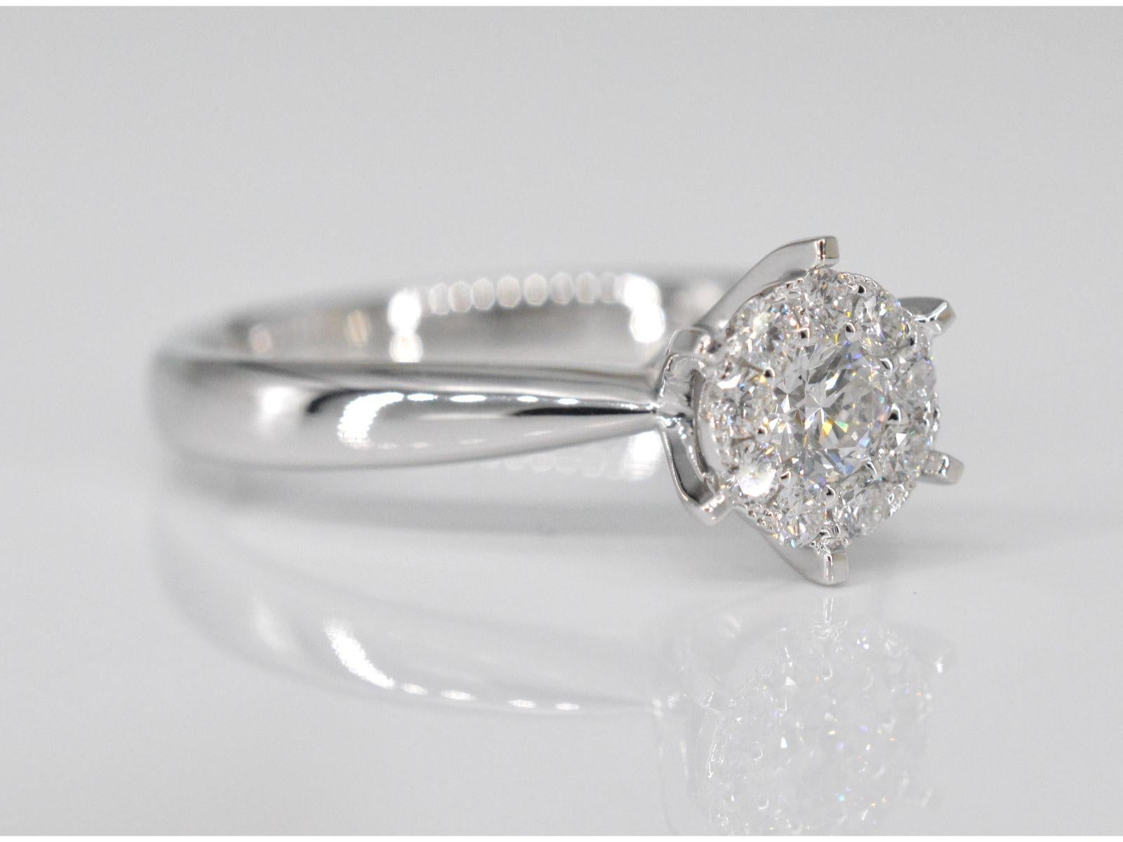 Brilliant Cut White Gold Solitaire Ring with Diamonds For Sale