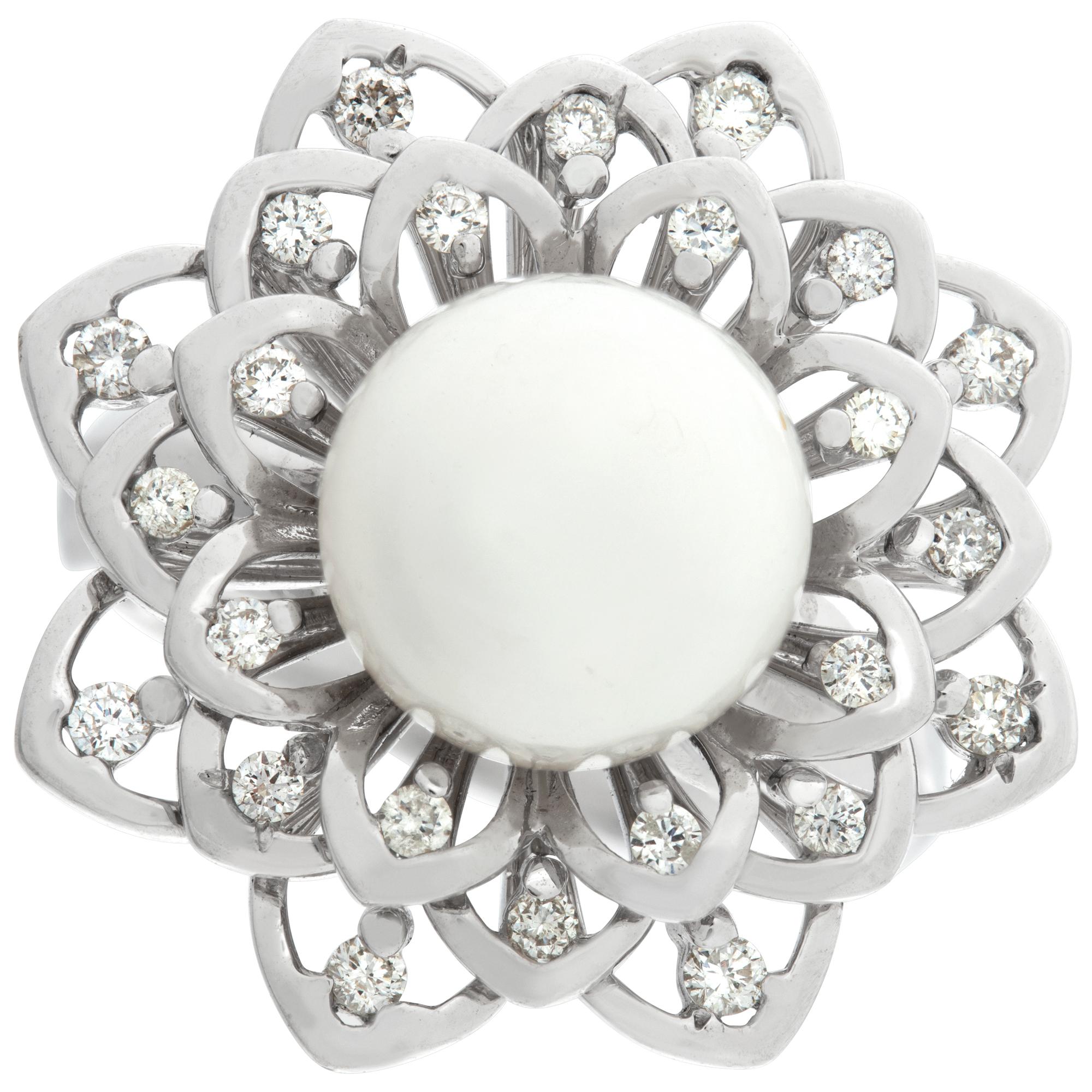 Sparkling diamond flower ring set with a 10mm South Sea Pearl all in 18k white gold with approximate 0.39 carat in round brilliant diamonds. Size 6.5.This Pearl/diamond ring is currently size 6.5 and some items can be sized up or down, please ask!