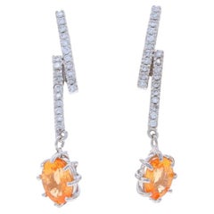 Boucles d'oreilles pendantes en or blanc grenat spessartite 14k ovale 2.75ctw Lightning Bolt