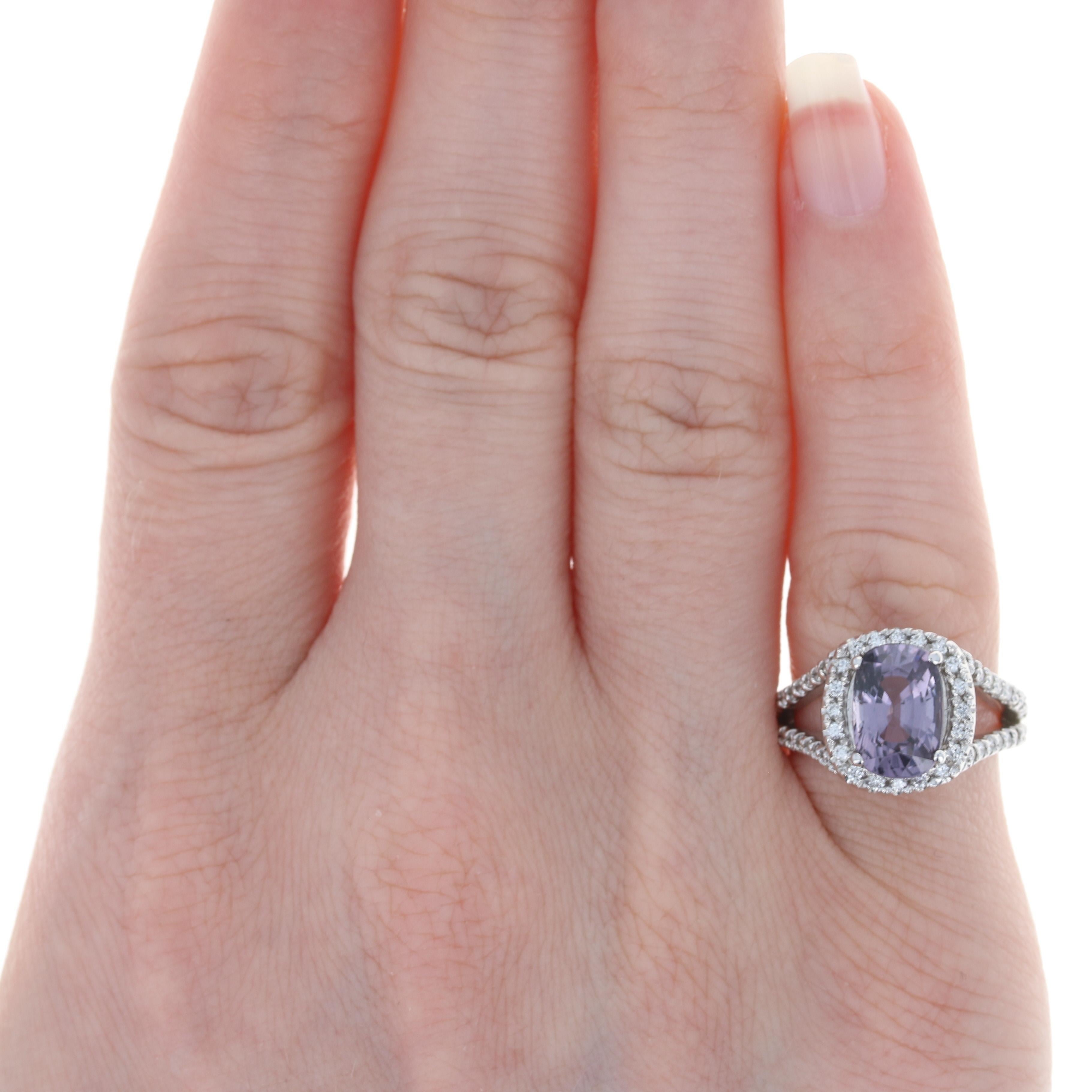 Size: 4 1/2
 Sizing Fee: Up 2 sizes for $40
 
 Metal Content: 14k White Gold
 
 Stone Information: 
 Genuine Spinel
 Carat: 2.62ct (weighed)
 Cut: Cushion
 Color: Purple 
 Size: 9.8mm x 6.6mm
 
 Natural Diamonds
 Carats: .45ctw
 Cut: Round
