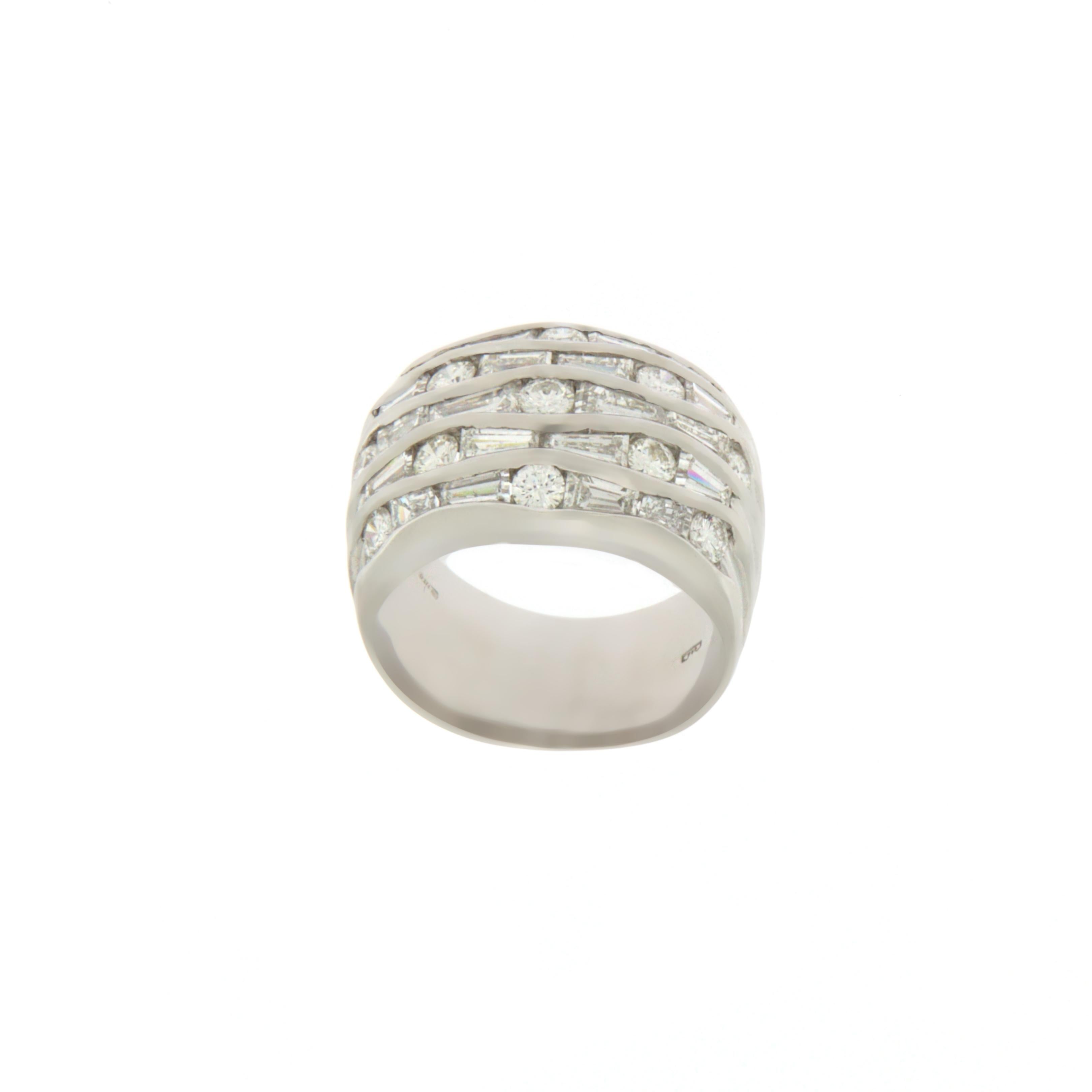 18-karat white gold band rings with diamonds round and baguette cut, entirely handmade by expert Italian goldsmiths.

Total weight of  diamonds 3 carats 
Shade scale H - Purity Vs1
Total weight of the ring 11 grams
Ring size 14 ITA - 6.75 USA - 54