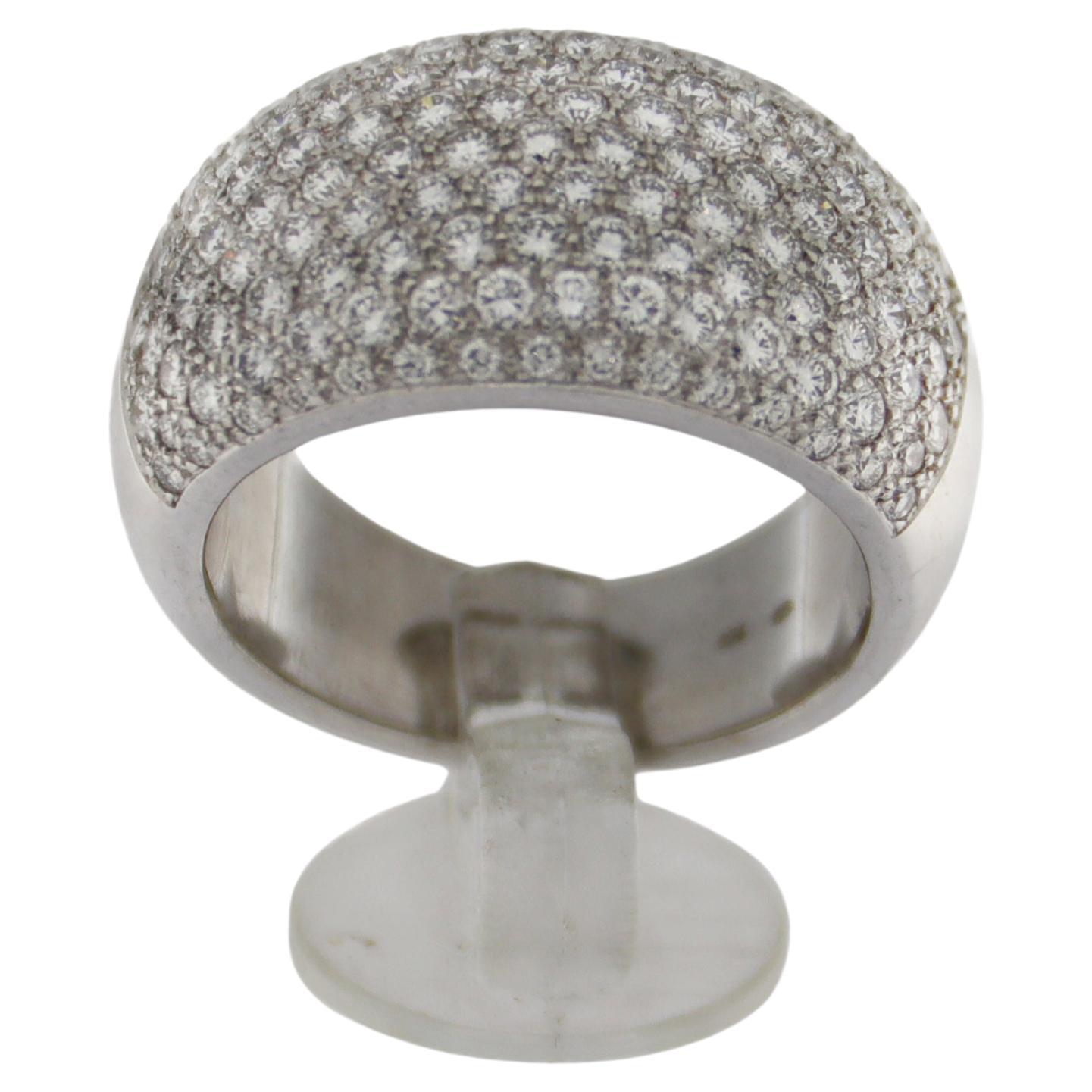 18-karat white gold band rings with diamonds, entirely handmade by expert Italian goldsmiths.

Total weight of diamonds 3.90 carats (0.02 carat each)
Shade scale H - Purity Vs1
Total weight of the ring 24.70 grams
Ring size 23 ITA - 10.25 USA - 63