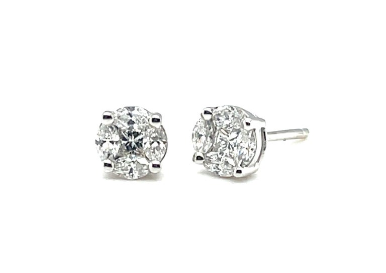 These diamond earrings give the illusion of larger single diamond studs! In fact, each earring is comprised of a single princess cut diamond framed by 4 marquise cut diamonds. While the total carat weight of these diamonds is .58 carats, each
