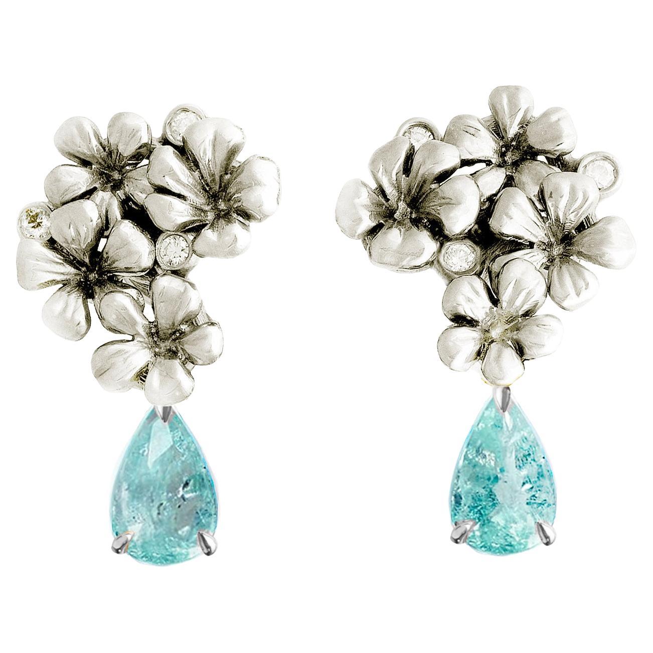 Clous d'oreilles en or blanc avec diamants et tourmalines Paraiba