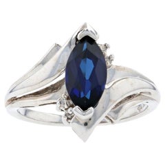 White Gold Synthetic Sapphire 
Diamond Bypass Ring, 10k Marquise Cut 1.17ctw